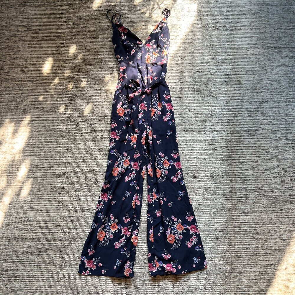 Women floral sleeveless tie umpsuit / split leg / V-neck / blue size M